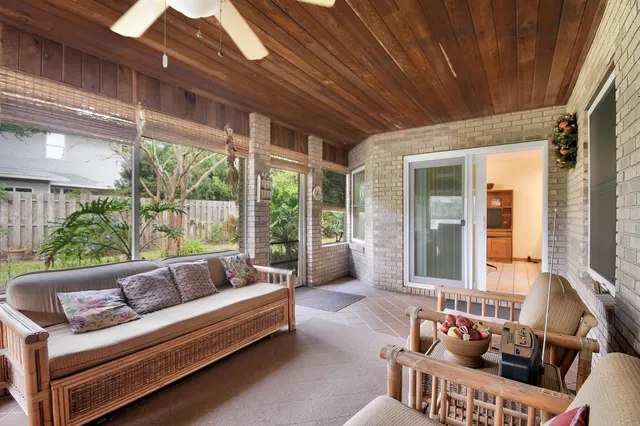 a outdoor living space with furniture and a potted plant