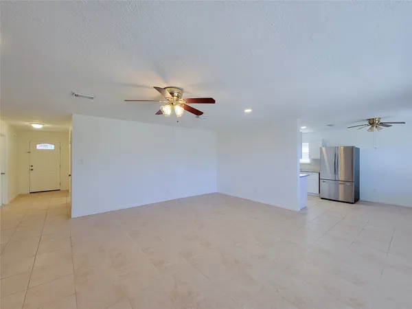 a view of a livingroom with natural light