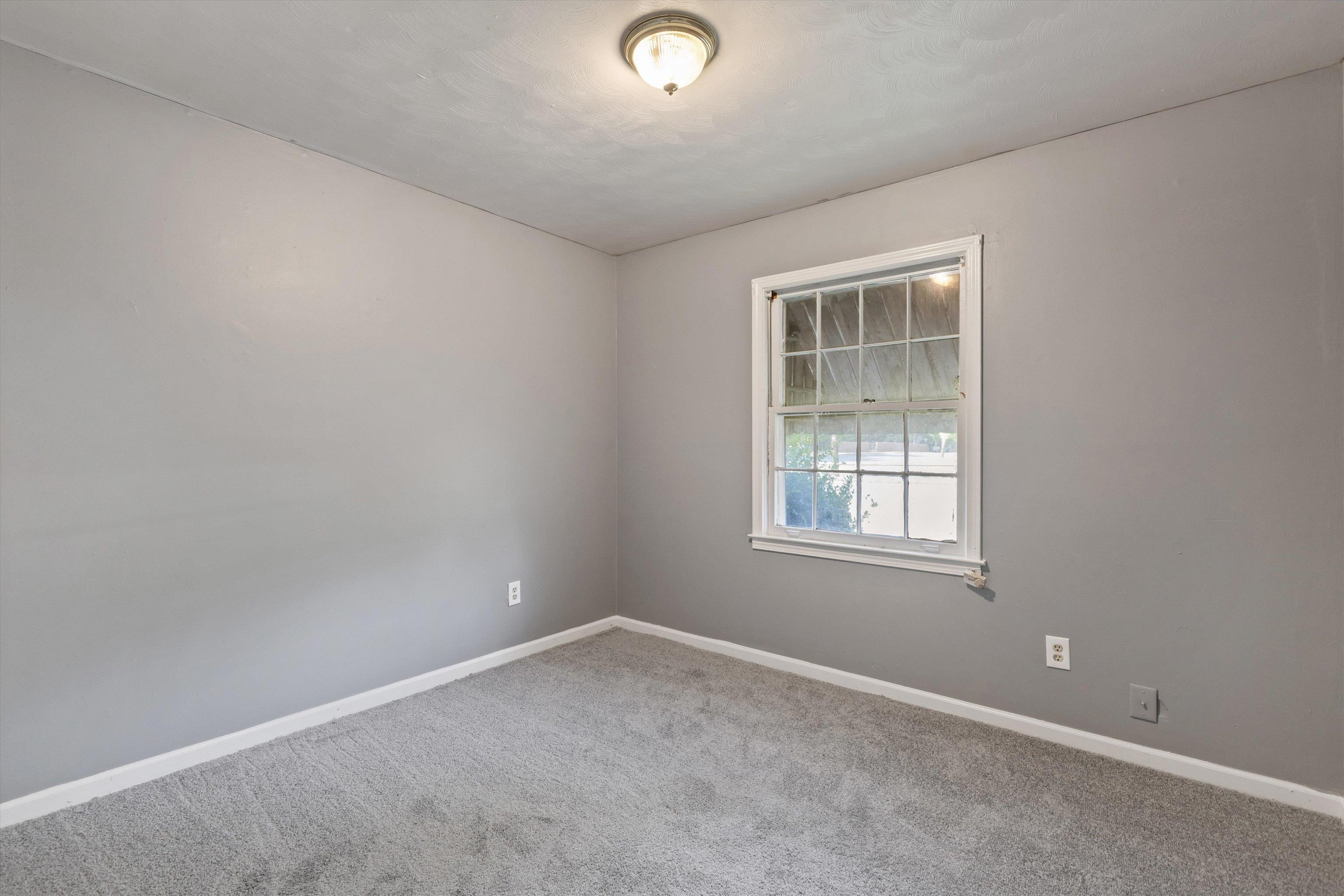 3580 Rhodes Avenue Memphis, TN 38111 - Photo 22 of 26 an empty room with a window