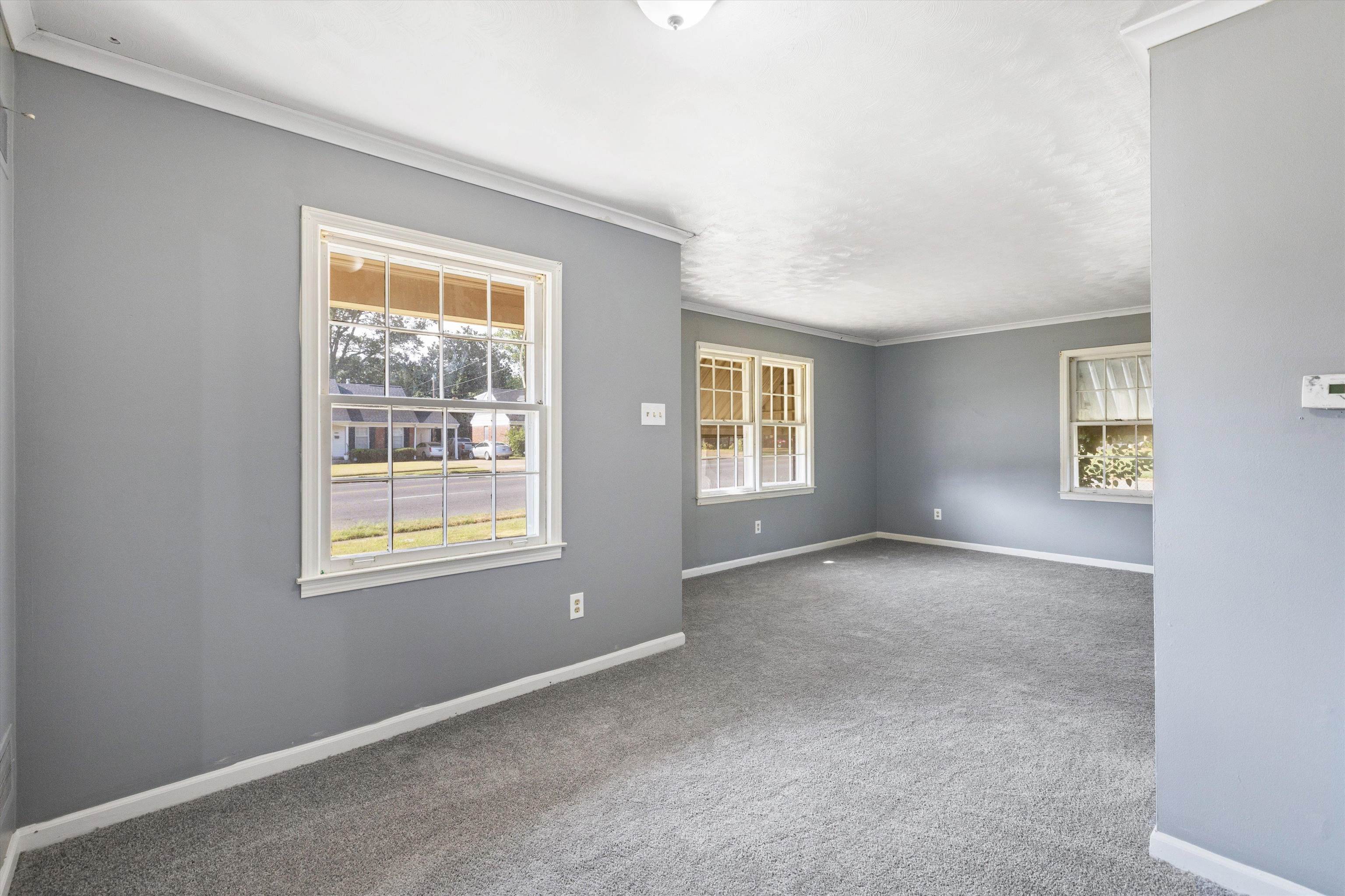 3580 Rhodes Avenue Memphis, TN 38111 - Photo 7 of 26 an empty room with windows