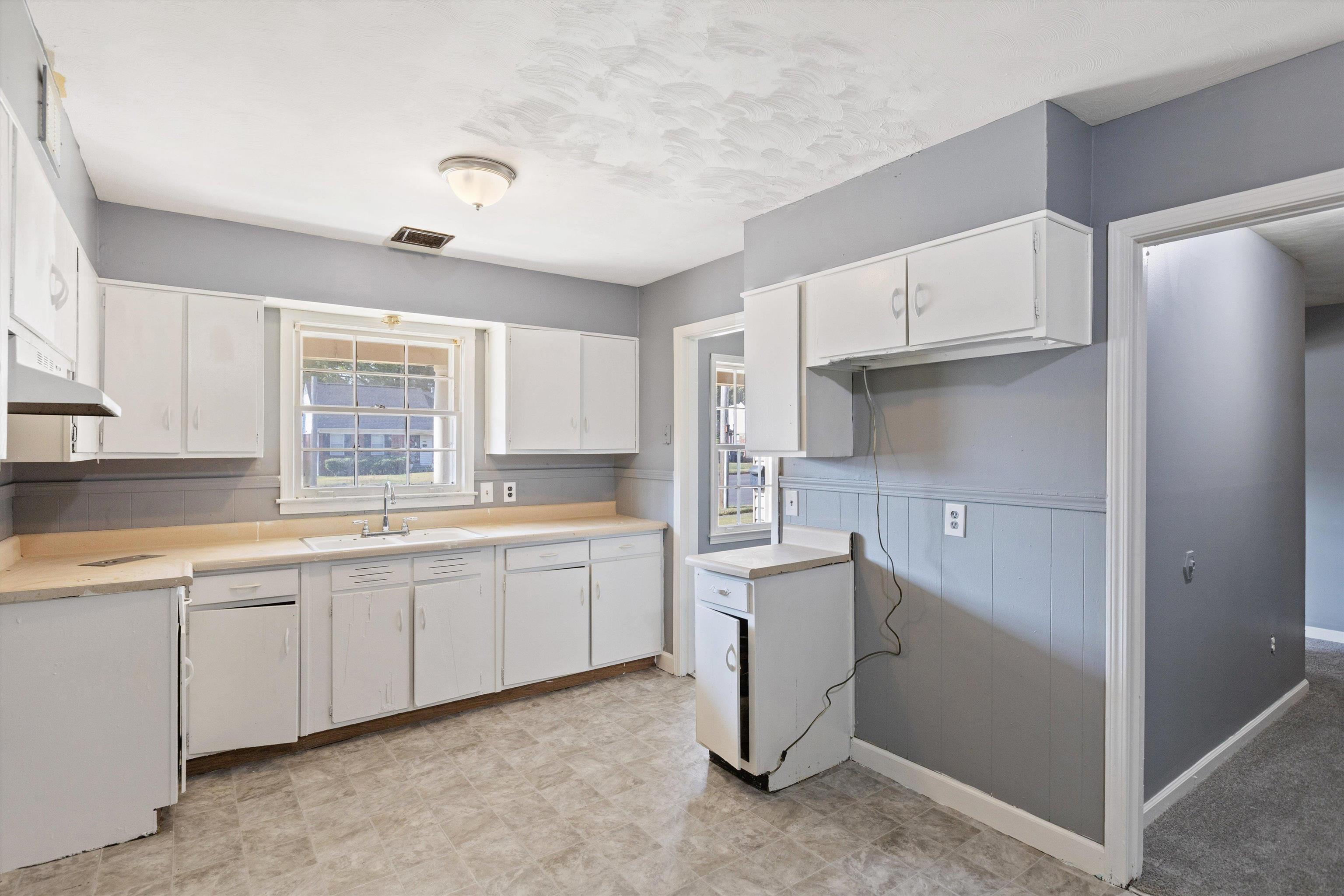 3580 Rhodes Avenue Memphis, TN 38111 - Photo 9 of 26 a kitchen with sink and cabinets