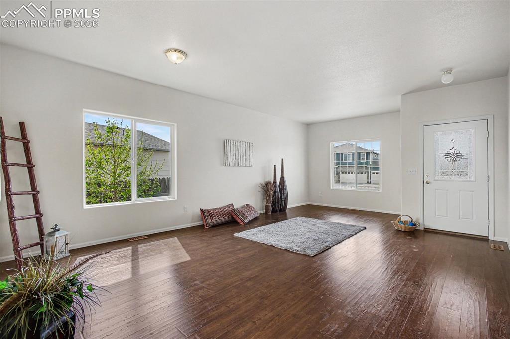 12210 Crystal Downs Road Peyton, CO 80831 - Photo 4 of 40 a view of an empty room and window