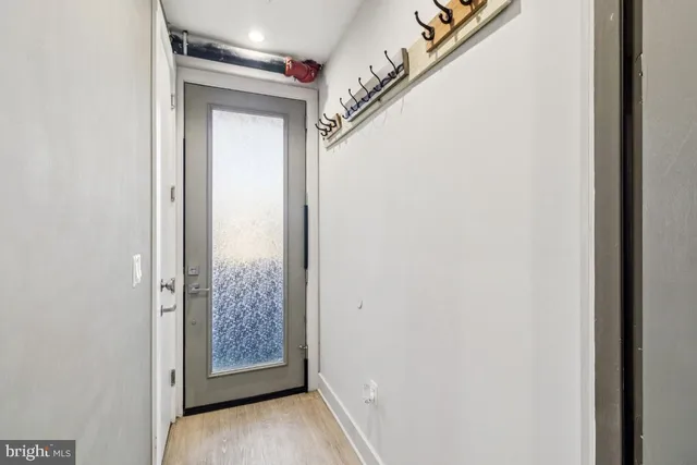 a view of hallway with shower