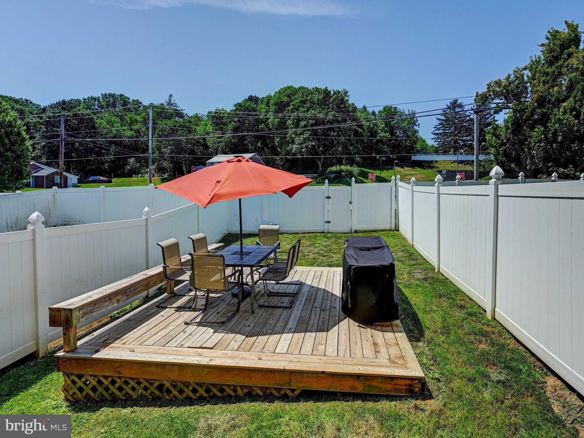 254 North Front Street New Freedom, PA 17349 - Photo 2 of 23 a view of a house with backyard sitting area and furniture