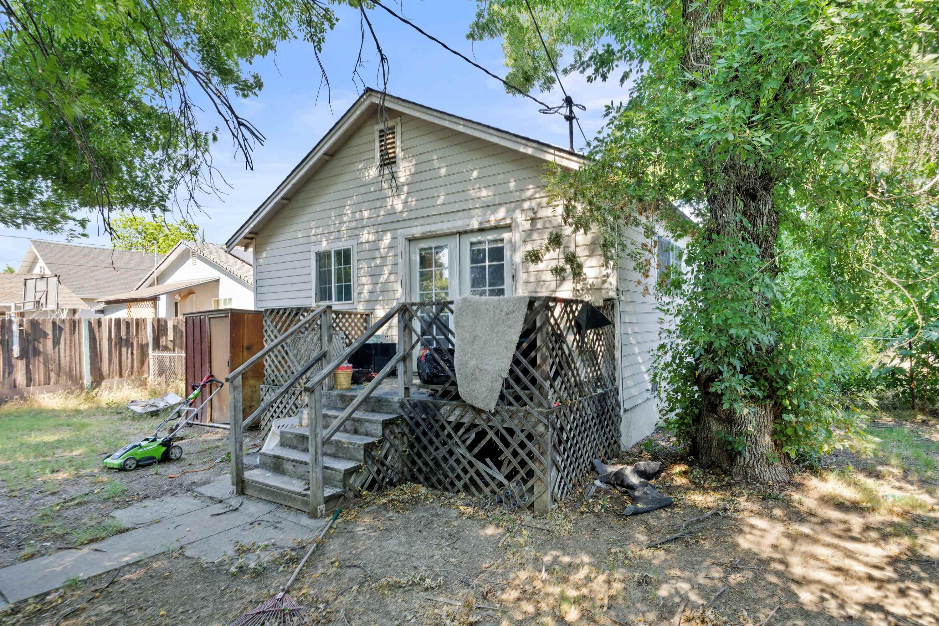 1220 5th Avenue Corning, CA 96021 - Photo 14 of 15 a view of a house with a yard