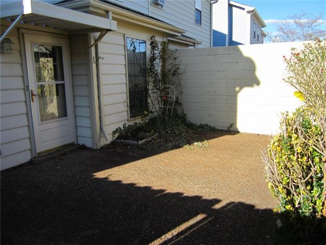 945 General George Patton Road, Unit 945 Nashville, TN 37221 - Photo 11 of 11 Cozy patio & 2 carport accomodates two cars |