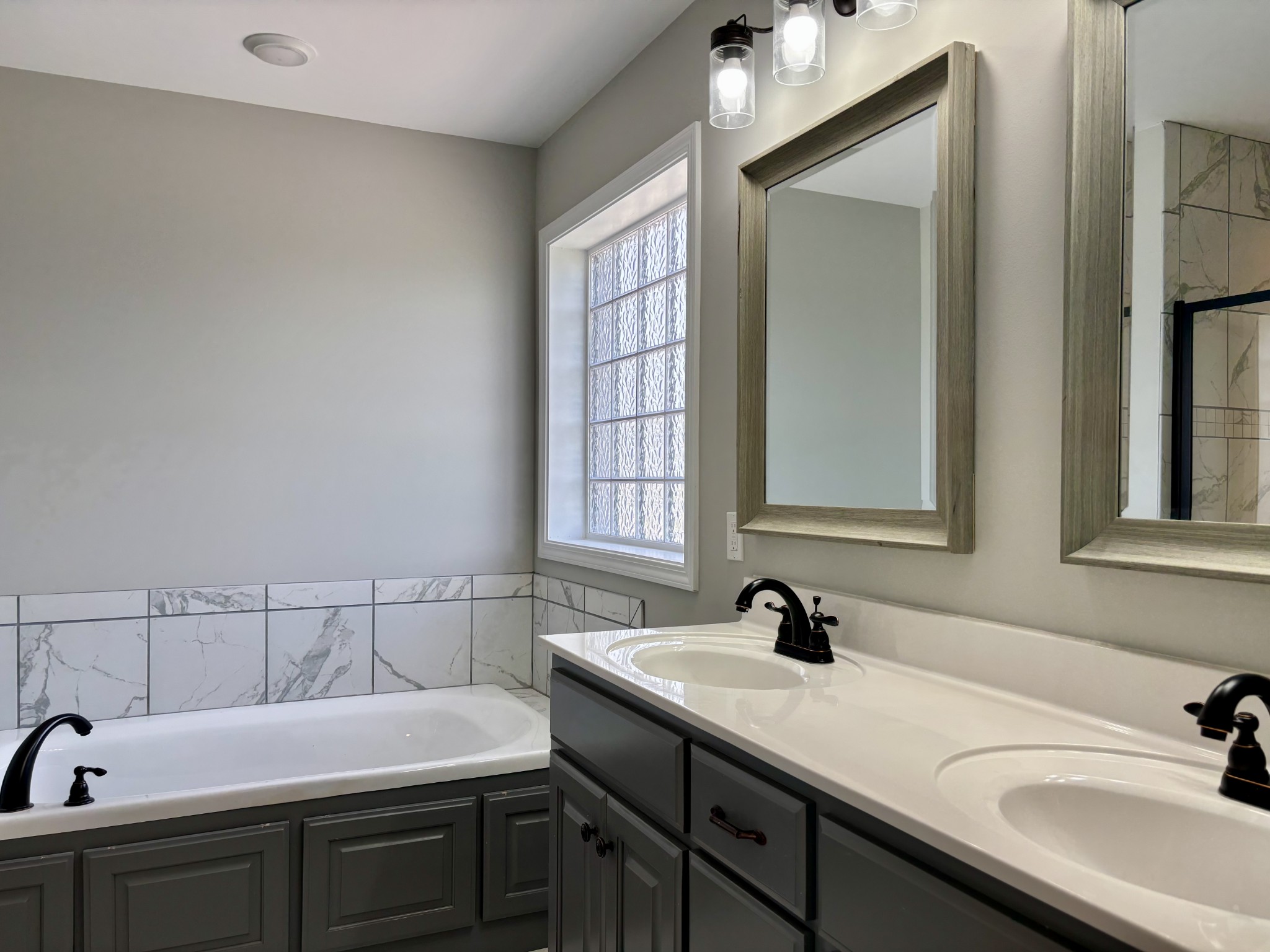 51 Regency Place Manchester, TN 37355 - Photo 13 of 27 a bathroom with a sink and a window