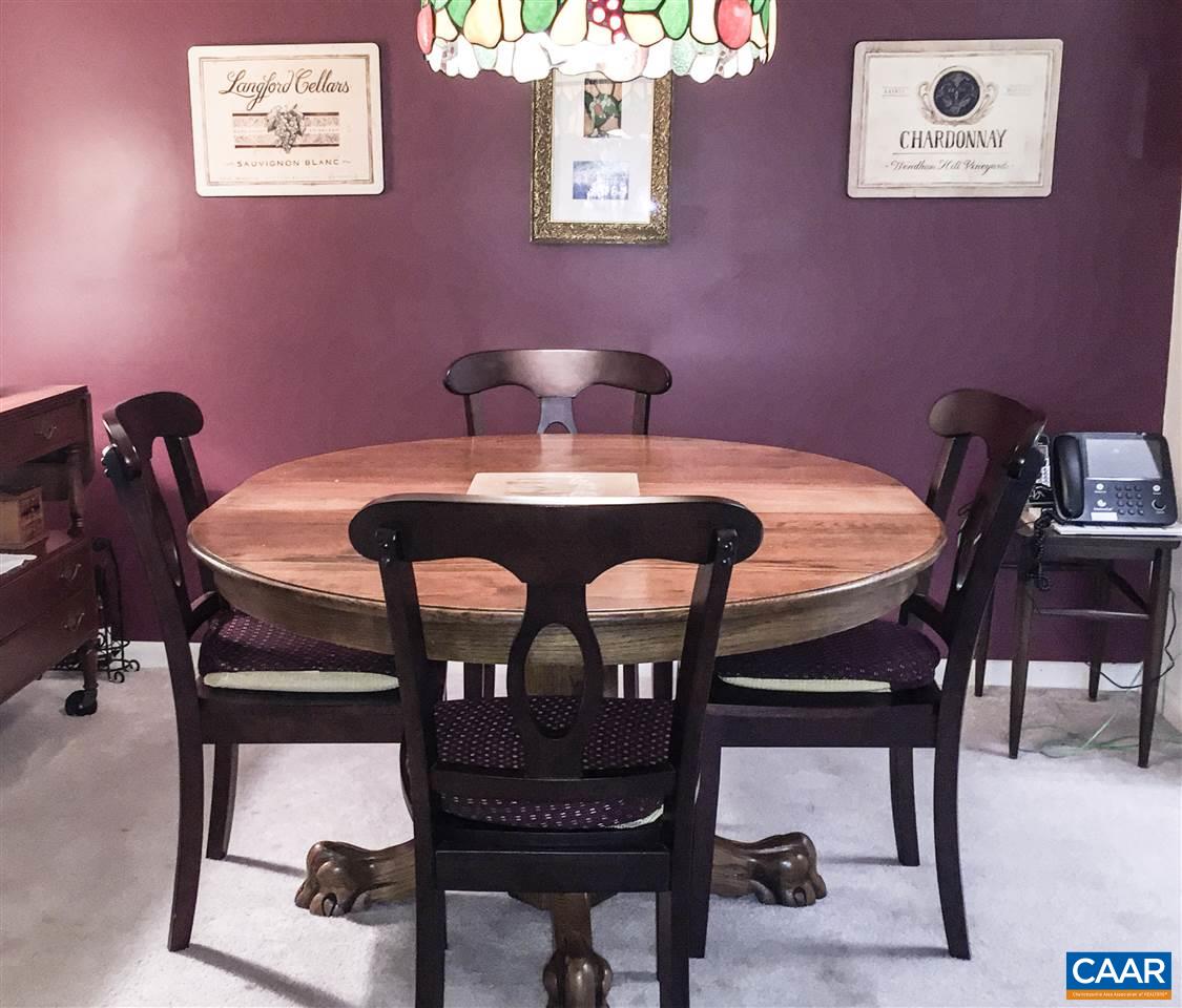 125 Turtle Creek Road, Unit 3 Charlottesville, VA 22901 - Photo 6 of 14 a dining room with furniture and window