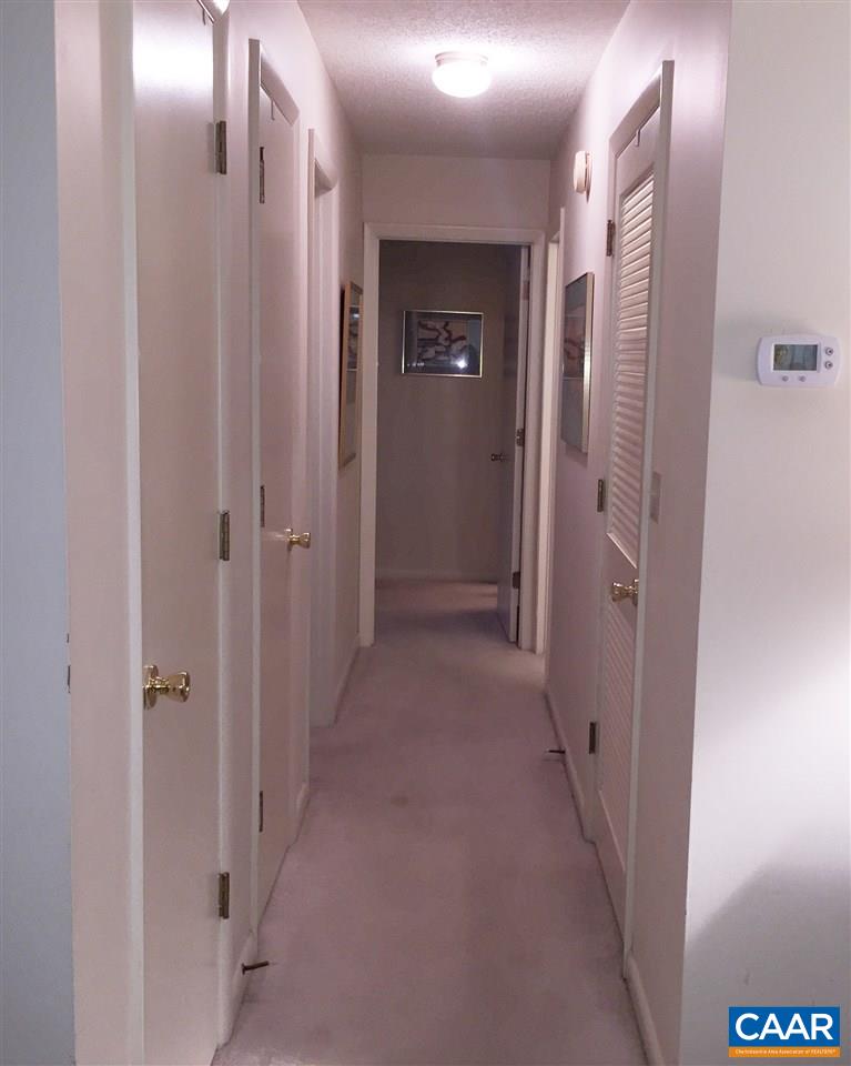 125 Turtle Creek Road, Unit 3 Charlottesville, VA 22901 - Photo 10 of 14 a view of a hallway with a elevator
