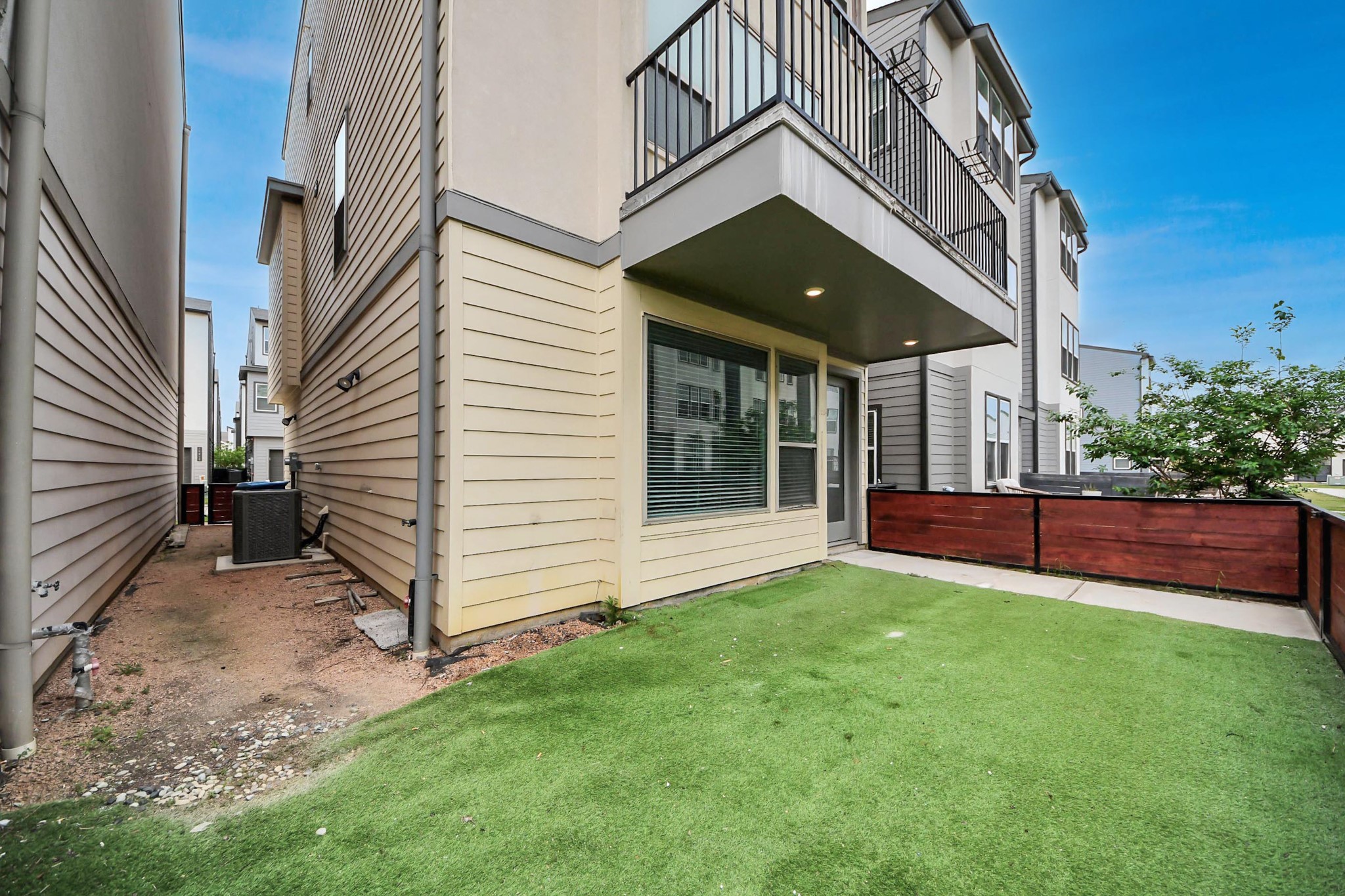 18527 Centro Row Conroe, TX 77385 - Photo 6 of 44 a view of an house with backyard and garden