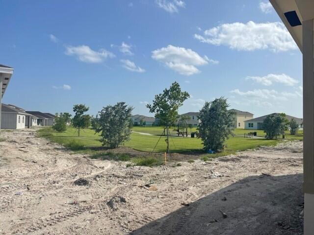 19044 Rolling Acrs Road Loxahatchee, FL 33470 - Photo 2 of 2 Cocoplum 2 Backyard view