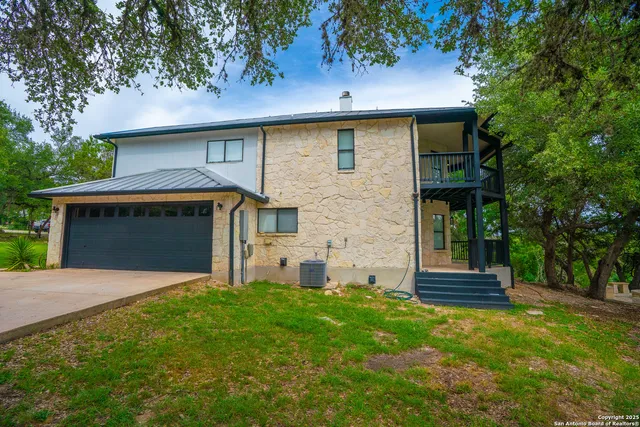 a bedroom with bed and window