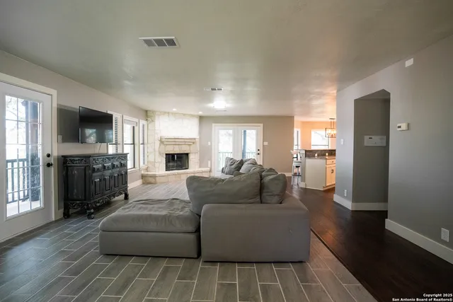 a view of balcony with two chairs and a table