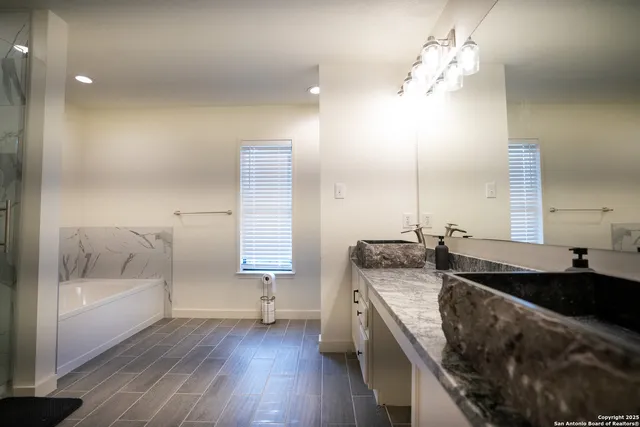 a bathroom with a shower and toilet