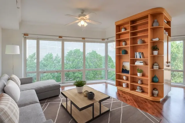 a living room with furniture and a window