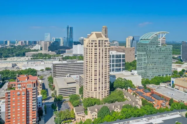 a view of a city with tall buildings