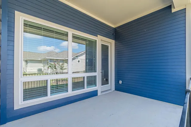 a view of a balcony with an outdoor space