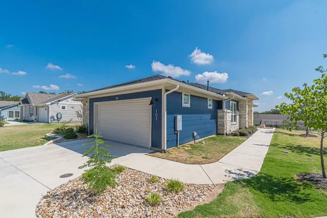 a view of empty room with windows