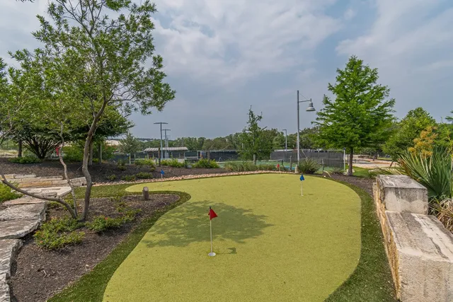 a view of a patio with chairs and a patio