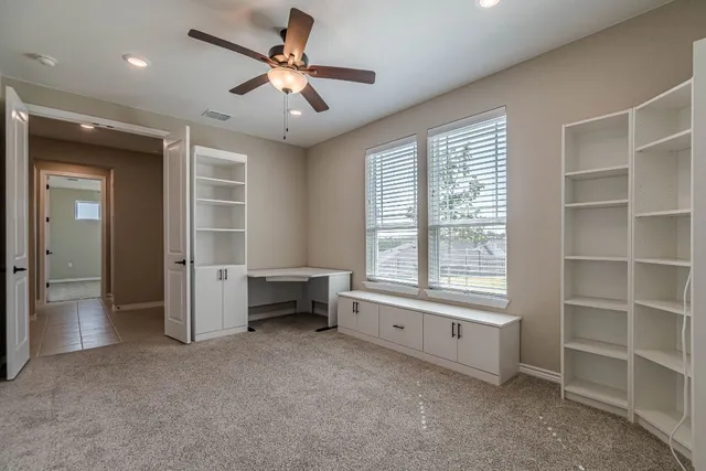 a lobby with furniture and window