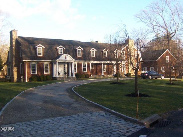 620 Eleven O'Clock Road Fairfield, CT 06824 - Photo 1 of 1 a front view of a house with a garden
