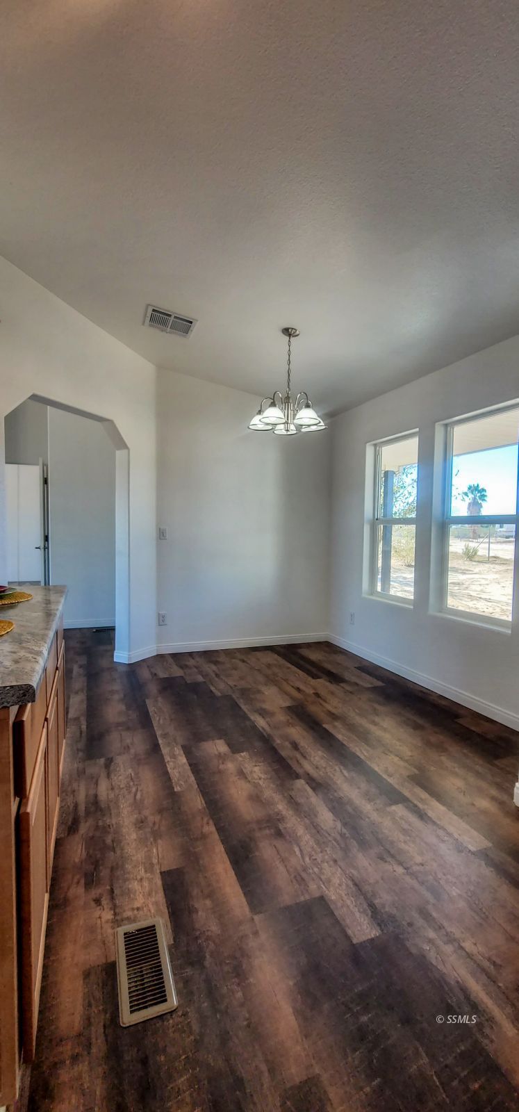 1056 North Alford Street Ridgecrest, CA 93555 - Photo 8 of 24 a view of an empty room and window