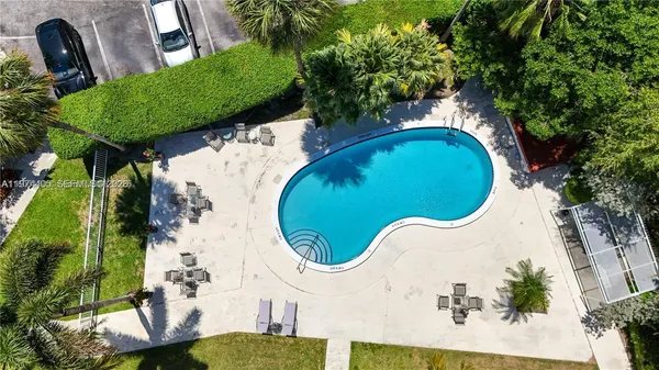 an aerial view of a swimming pool