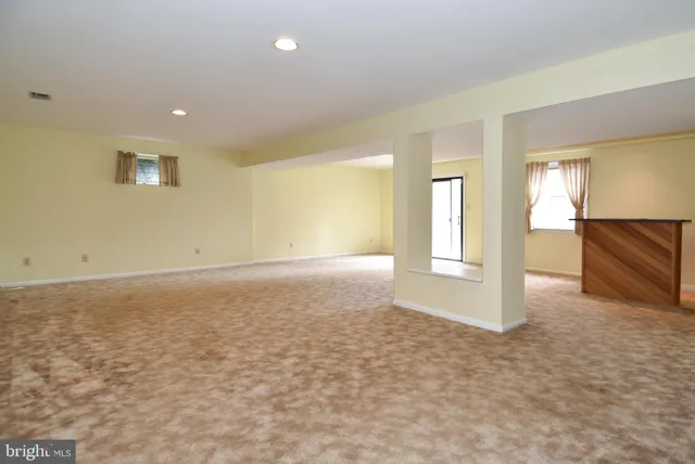 an empty room with a natural light