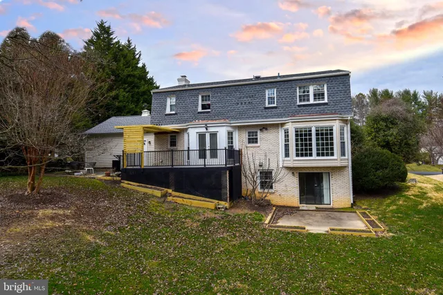 a view of house with yard and entertaining space