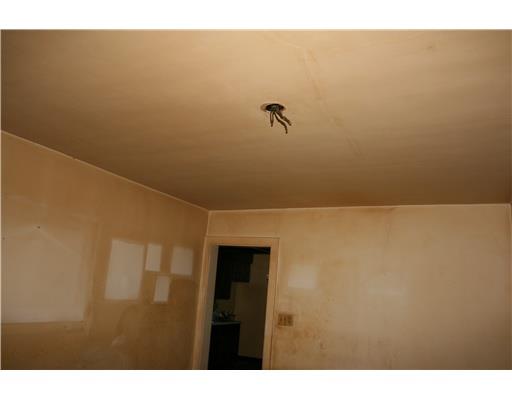 1284 Butler Road Springdale, PA 15144 - Photo 9 of 9 Living Room. Downstairs living room. It was a smokers dwelling.