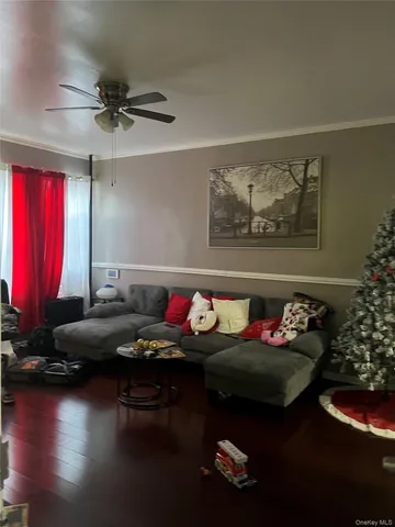 a room with furniture and wooden floor