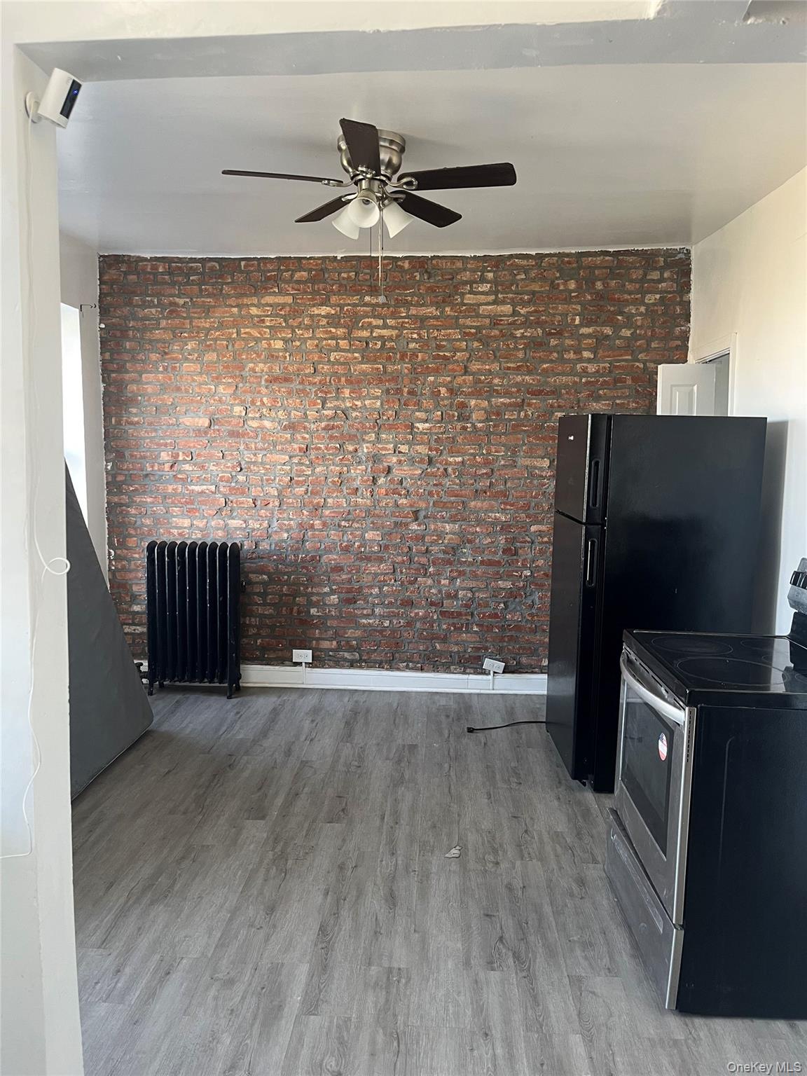 2393 Walton Avenue Bronx, NY 10468 - Photo 10 of 13 a view of workspace with wooden floor