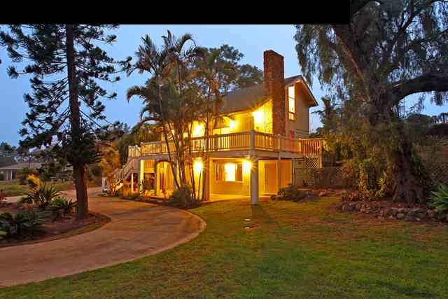 223 Ainakula Road Kula, HI 96790 - Photo 1 of 30 a backyard of a house with lots of green space