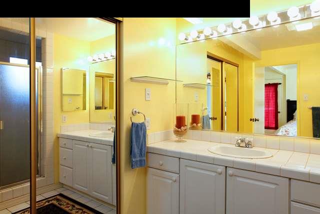 223 Ainakula Road Kula, HI 96790 - Photo 14 of 30 a bathroom with a sink and a mirror