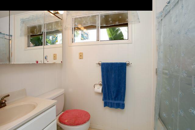 223 Ainakula Road Kula, HI 96790 - Photo 19 of 30 a bathroom with a toilet and a sink