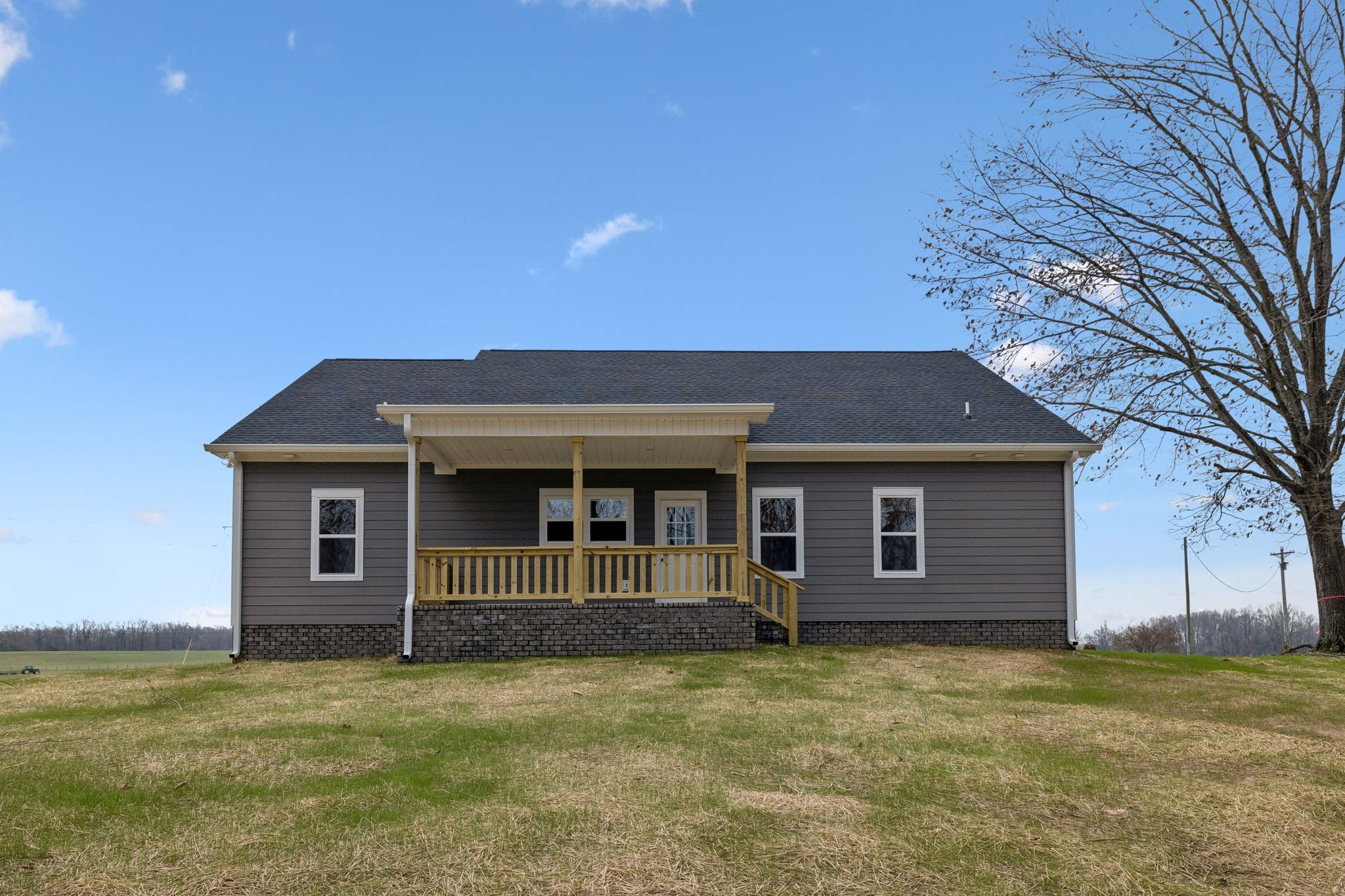 4083 Long Creek Road Lafayette, TN 37083 - Photo 35 of 36 a front view of a house with a garden
