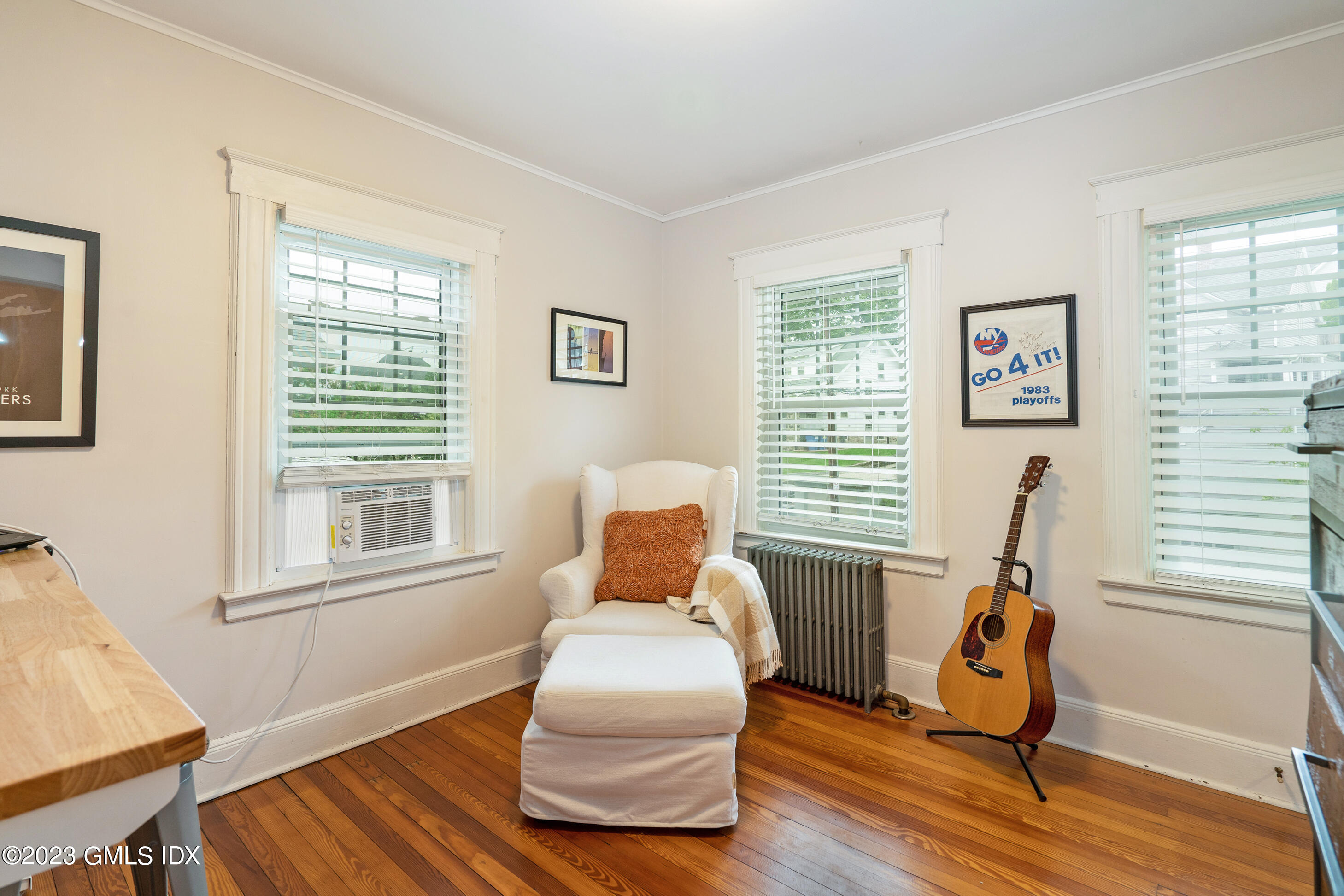 328 Delavan Avenue Greenwich, CT 06830 - Photo 17 of 25 a bedroom with furniture and a window