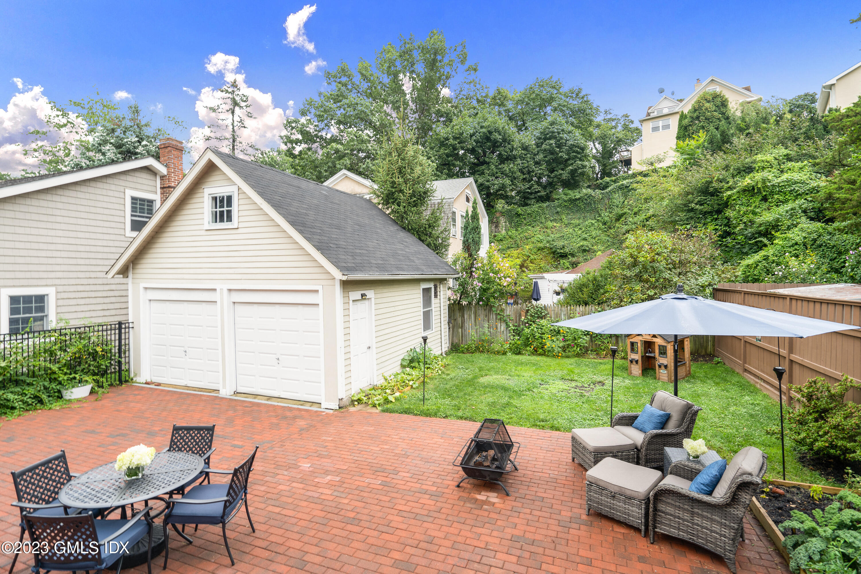 328 Delavan Avenue Greenwich, CT 06830 - Photo 20 of 25 a house view with a seating space