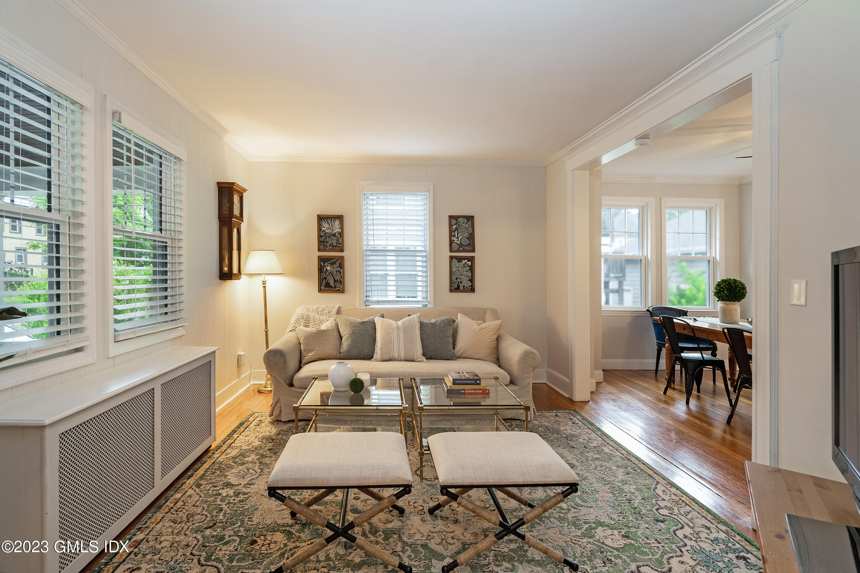 328 Delavan Avenue Greenwich, CT 06830 - Photo 4 of 25 a living room with furniture and wooden floor