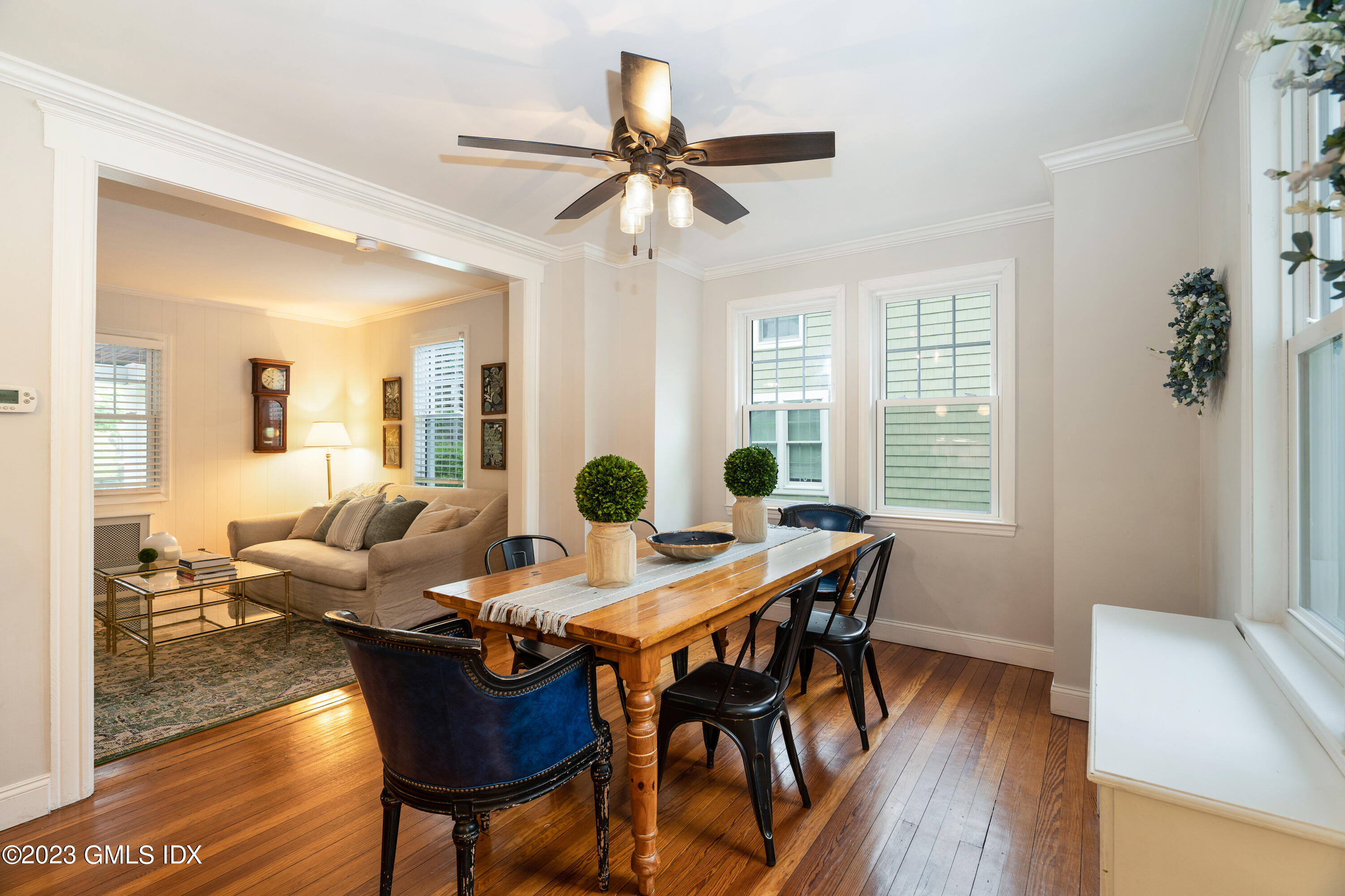 328 Delavan Avenue Greenwich, CT 06830 - Photo 5 of 25 a view of a dining room with furniture and wooden floor