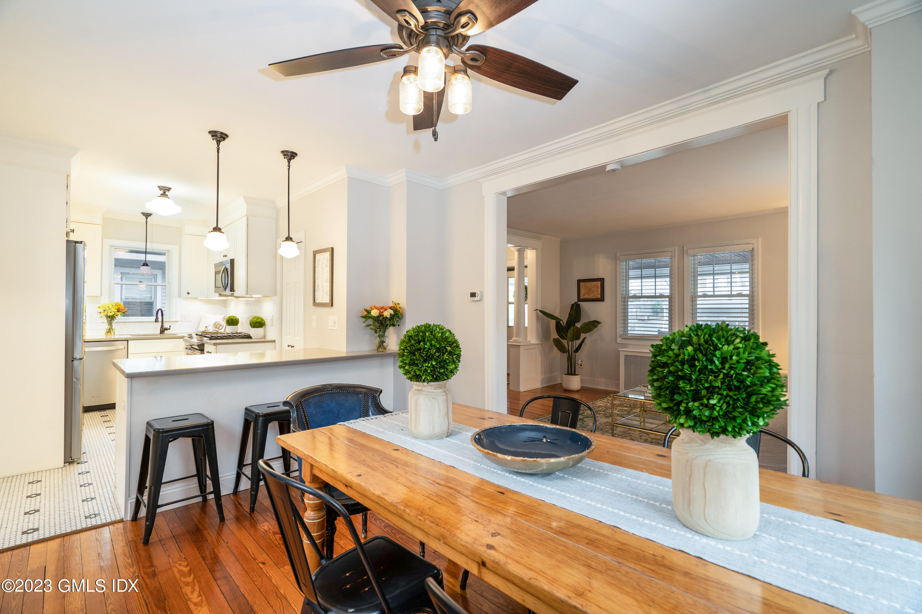 328 Delavan Avenue Greenwich, CT 06830 - Photo 6 of 25 a view of a dining room with furniture and wooden floor