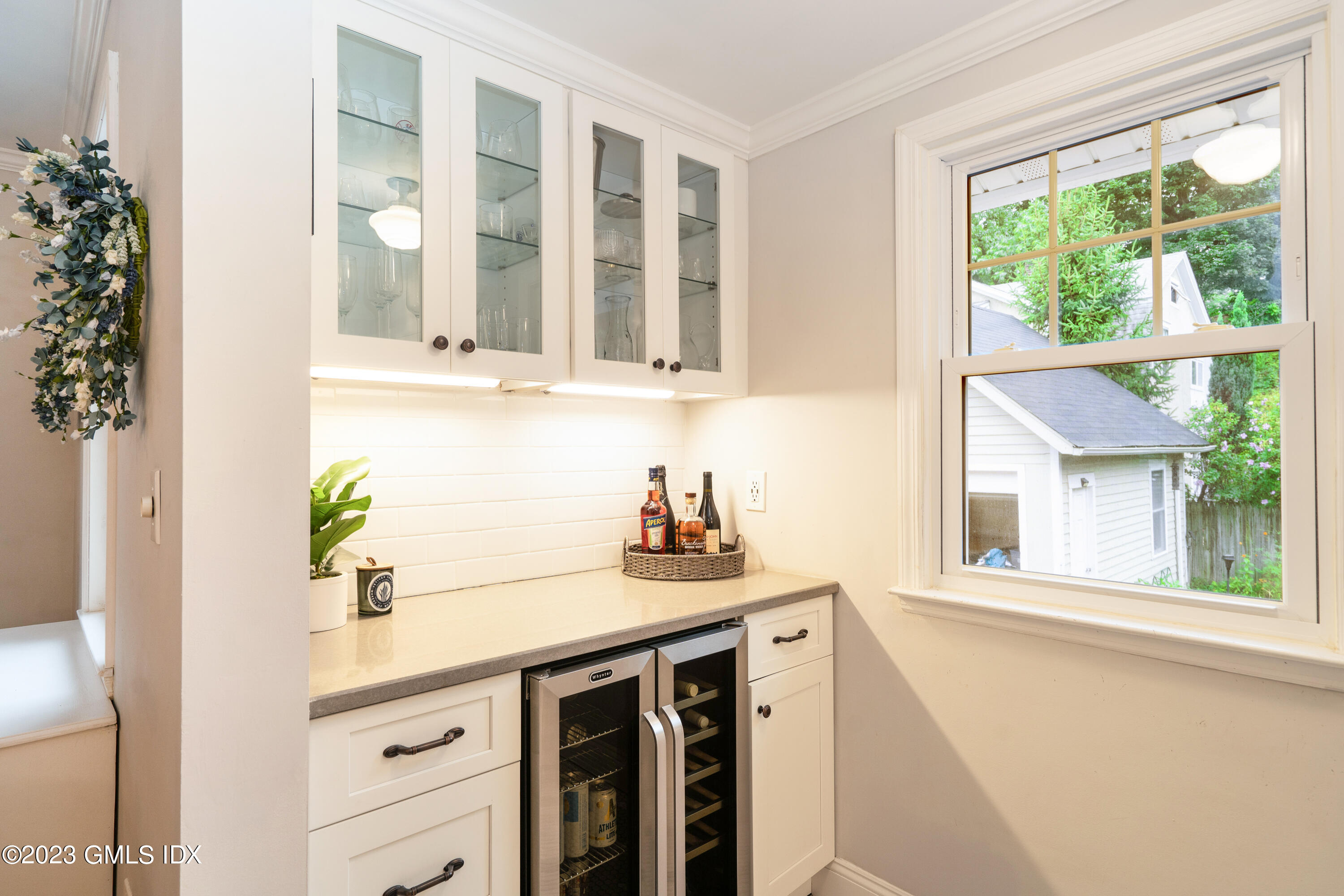 328 Delavan Avenue Greenwich, CT 06830 - Photo 9 of 25 a kitchen with a sink and a window