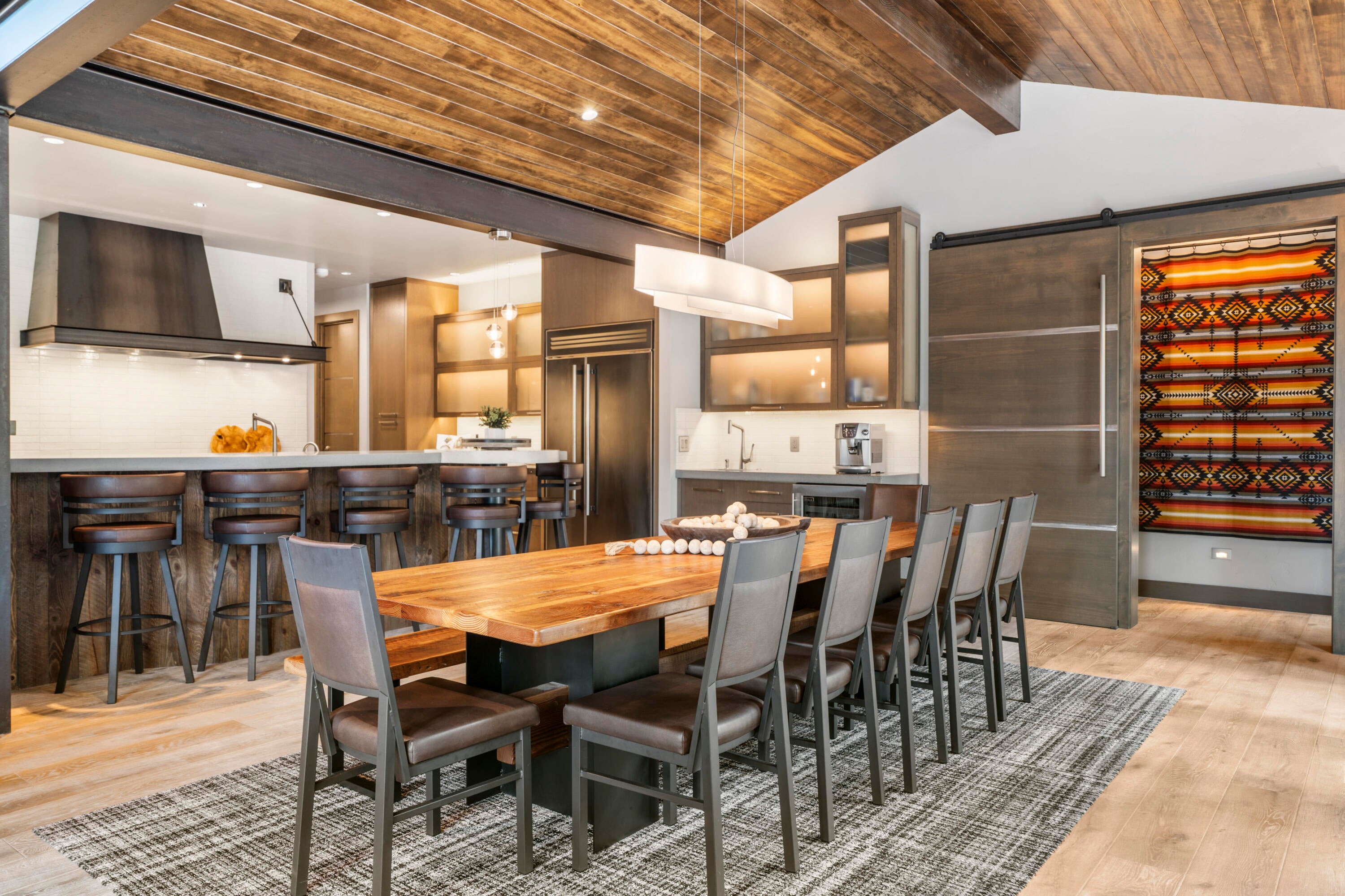 56641 Sunstone Loop, Unit 135 Bend, OR 97707 - Photo 9 of 62 Additional luxury touches include hand-routed steel-trimmed doors, custom cabinetry & lighting throughout.