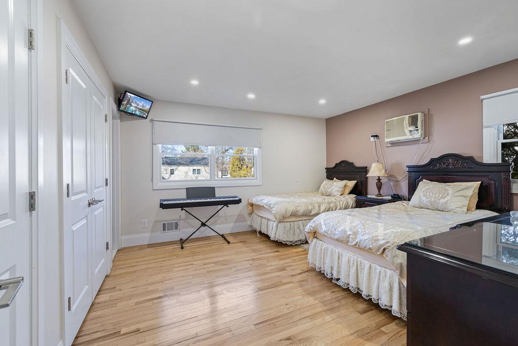 79 Francis Place Spring Valley, NY 10977 - Photo 15 of 37 a living room with two couches and wooden floor