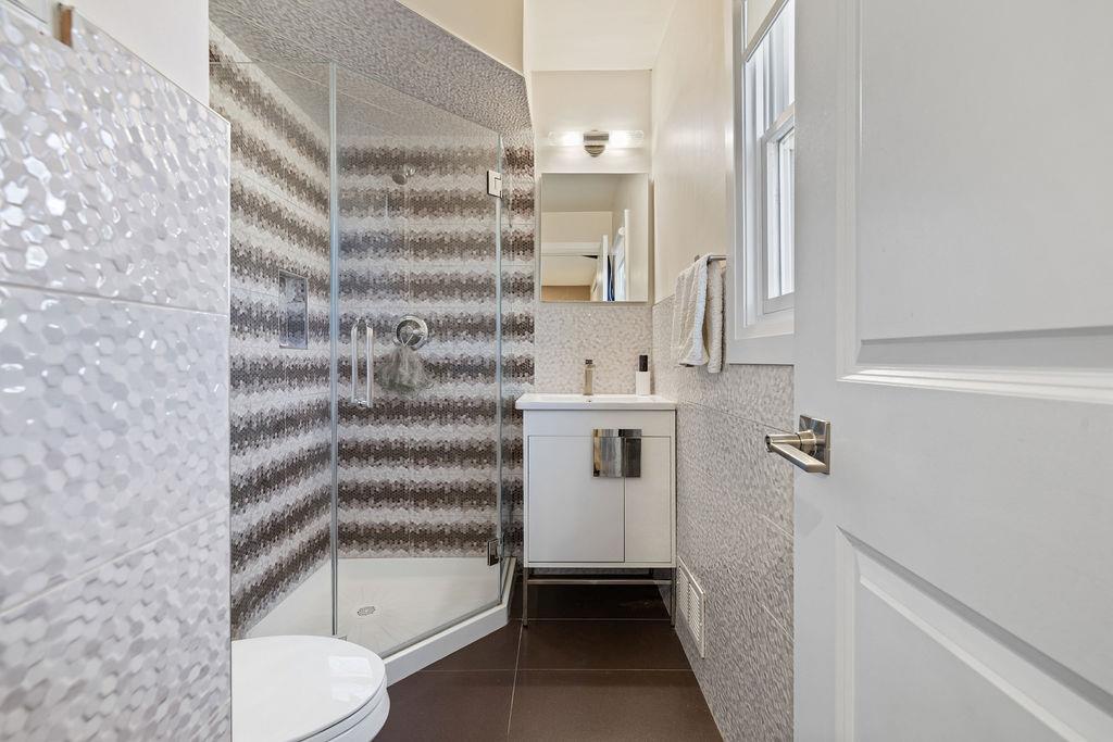 79 Francis Place Spring Valley, NY 10977 - Photo 17 of 37 a bathroom with a shower and a sink