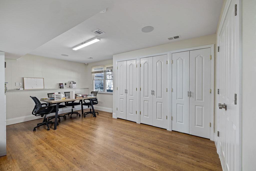 79 Francis Place Spring Valley, NY 10977 - Photo 21 of 37 a view of a work space with furniture and wooden floor