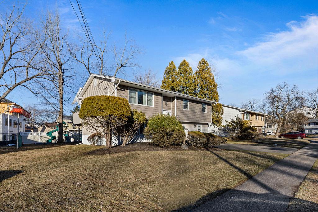 79 Francis Place Spring Valley, NY 10977 - Photo 33 of 37 a view of a house with a yard