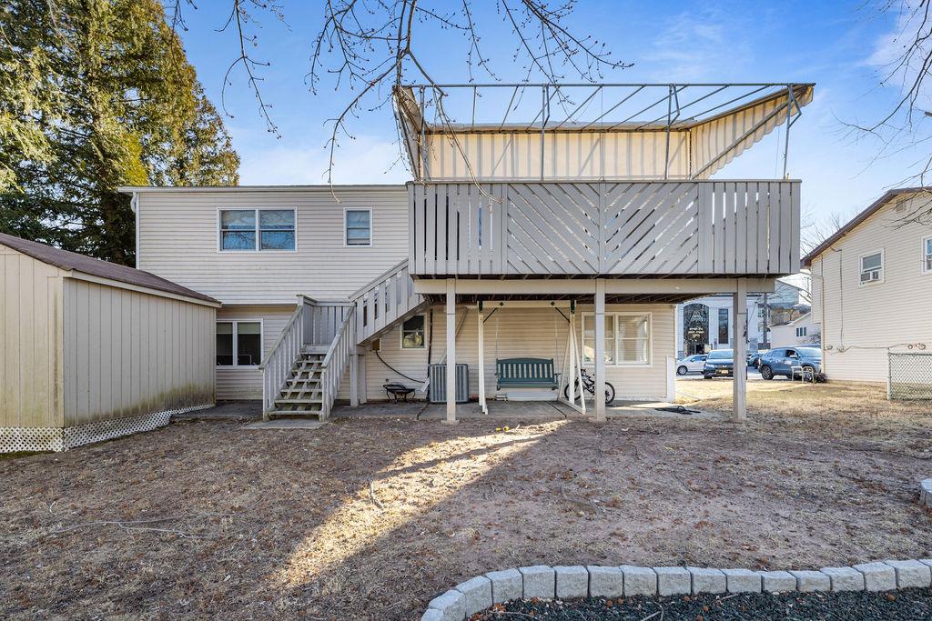 79 Francis Place Spring Valley, NY 10977 - Photo 35 of 37 a view of a house with a patio