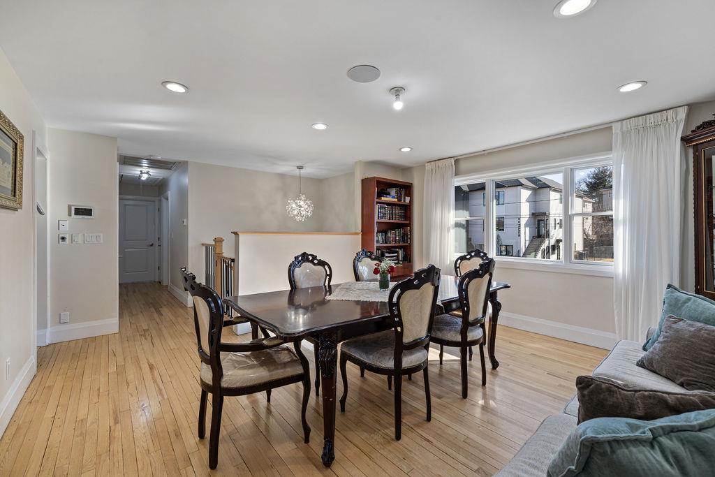 79 Francis Place Spring Valley, NY 10977 - Photo 6 of 37 a view of a dining room with furniture and wooden floor