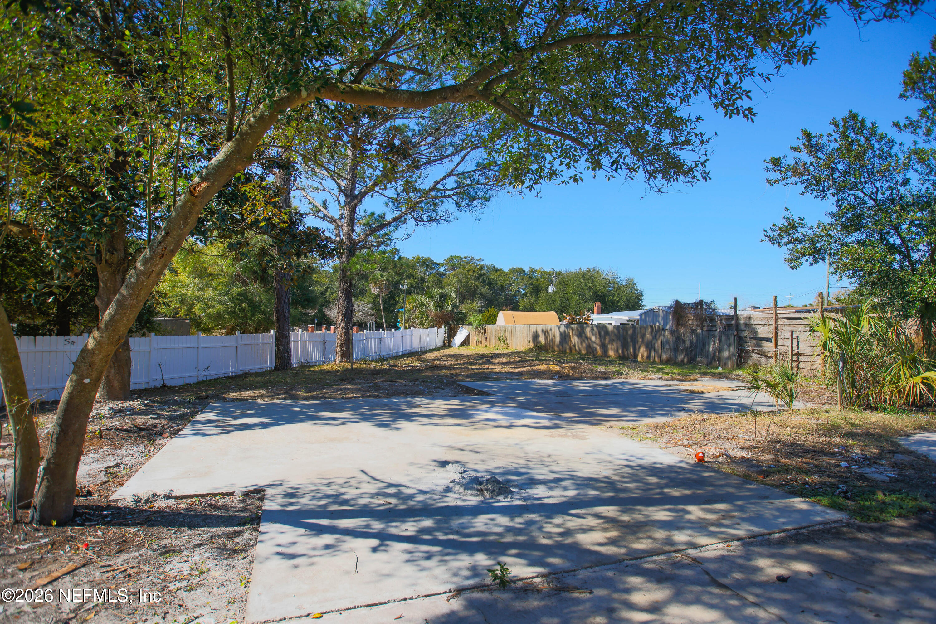 203 Rio Road Jacksonville, FL 32218 - Photo 24 of 24 a view of a yard with trees
